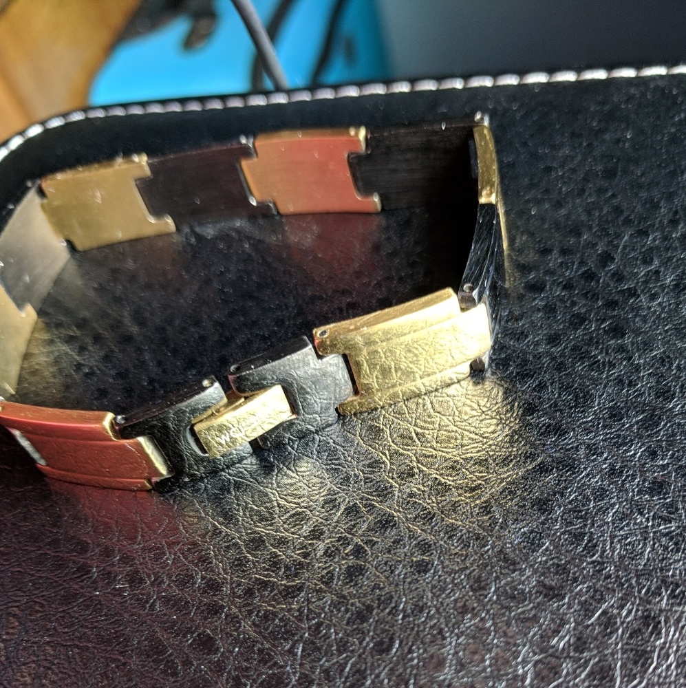 2 tone Gold / gun metal sizable casino bracelet